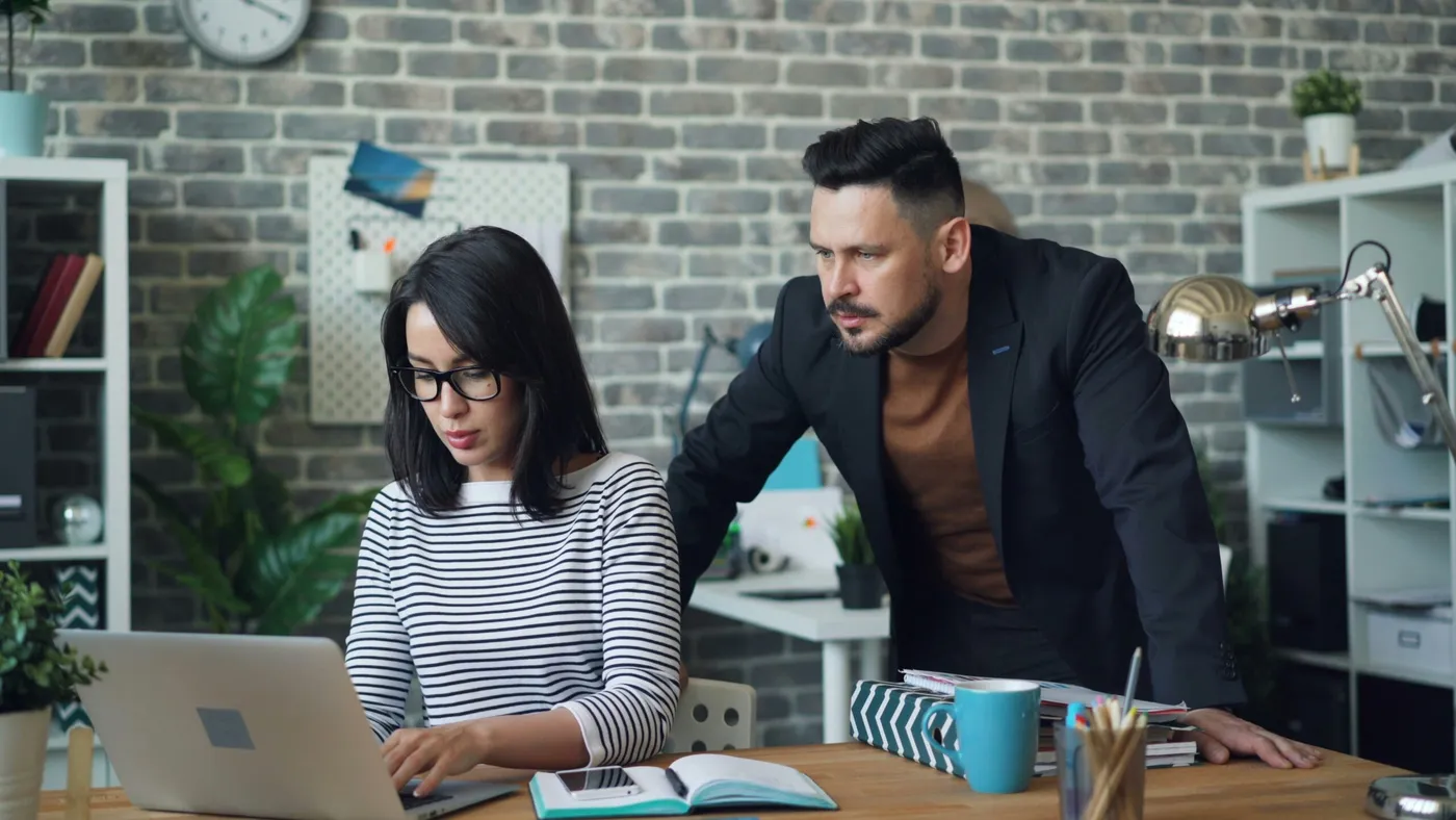 Colleagues in a meeting around a conference table
