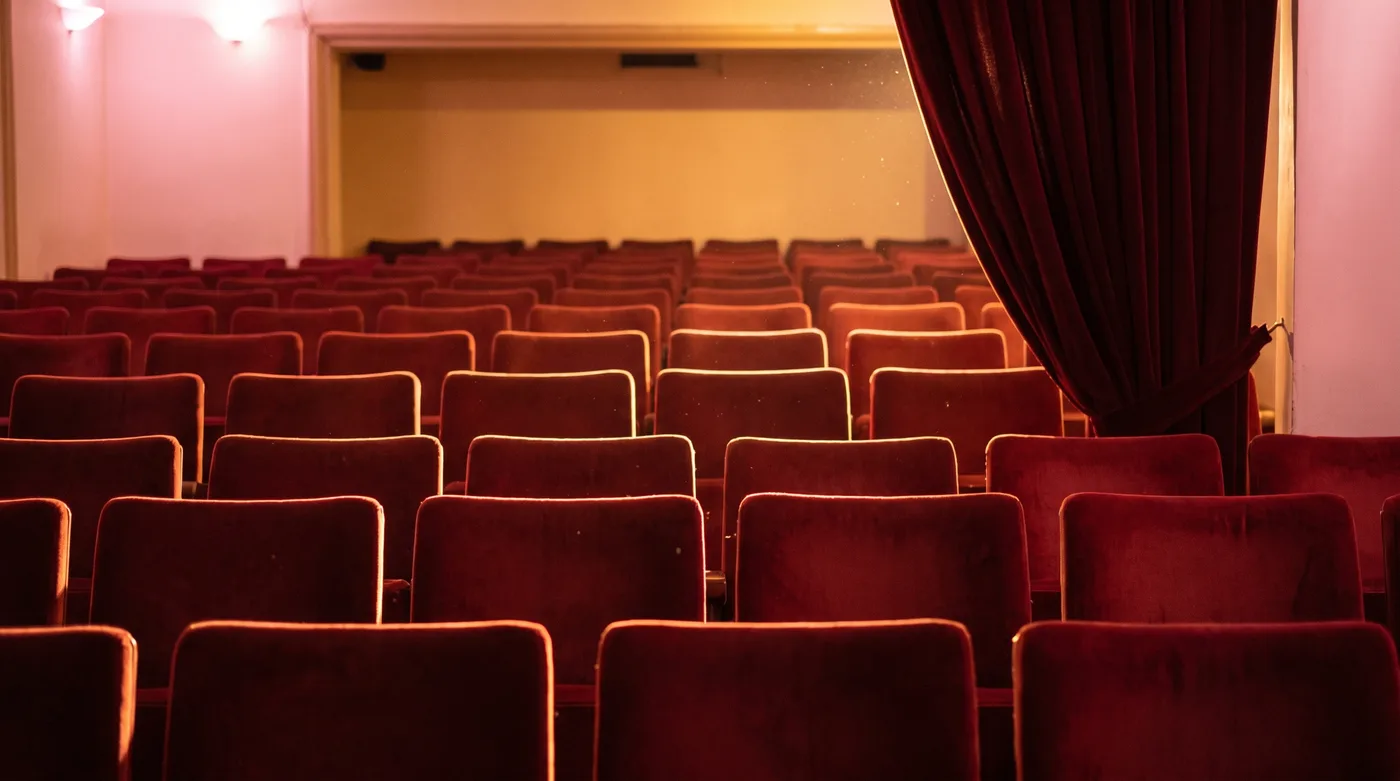 Women's events Phoenix: empty red theater seats under warm stage light before a performance