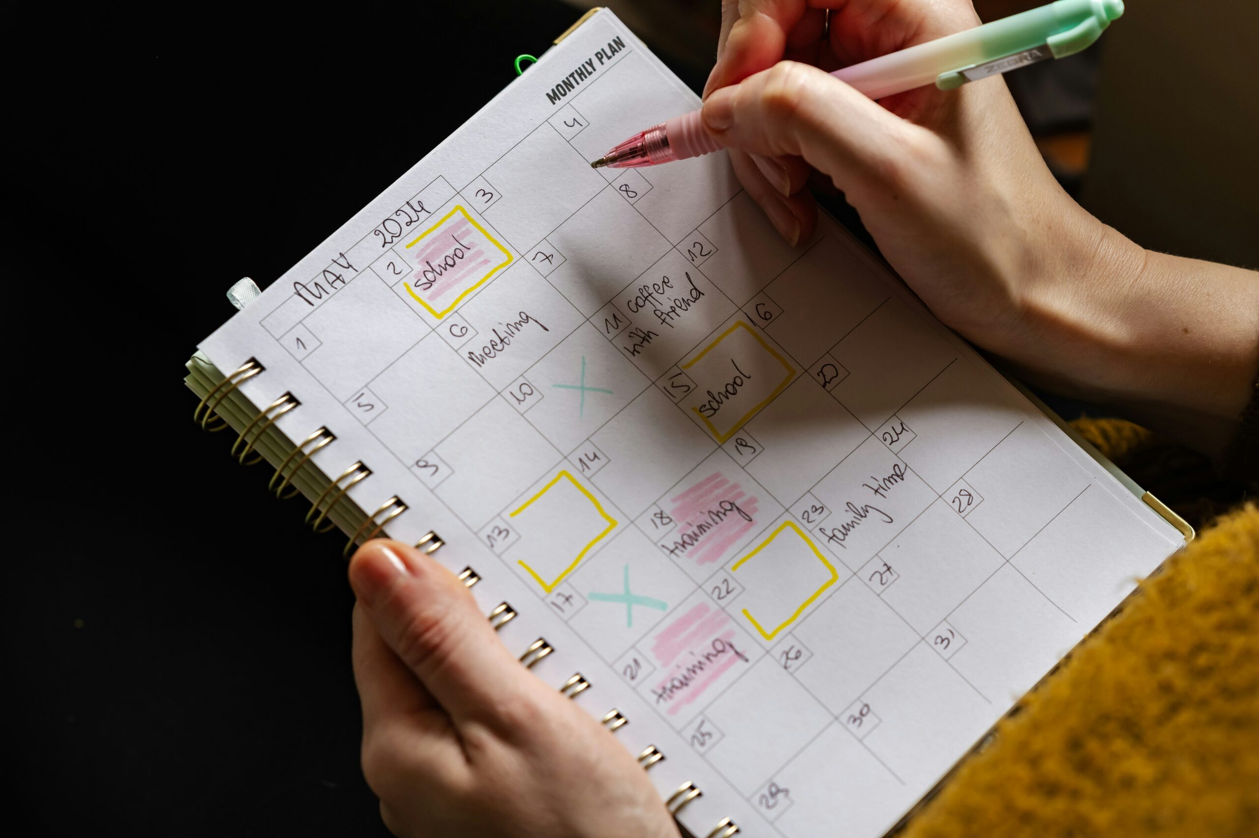 Interactive calendar displaying various remote volunteering time slots across different time zones with color-coded commitment levels